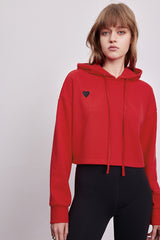 MADEINAM. Red heart cropped hoodies. Red hoodie with black heart. Cropped red hoodie with black heart embroidery.