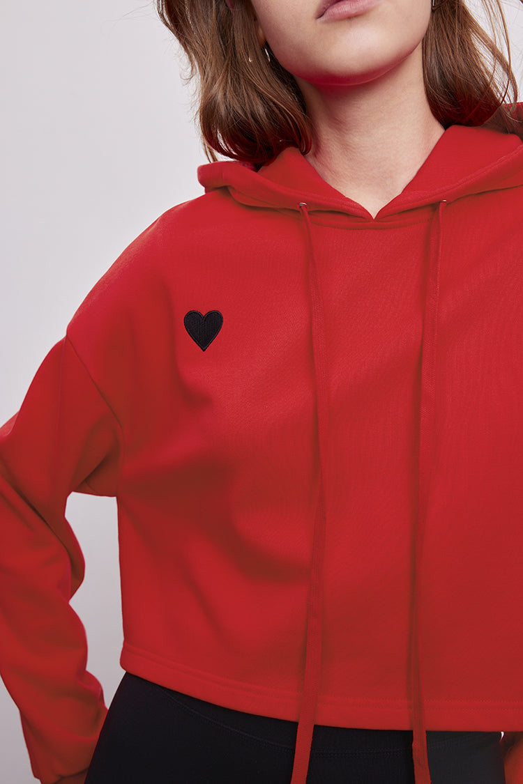 MADEINAM. Red heart cropped hoodies. Red hoodie with black heart. Cropped red hoodie with black heart embroidery.