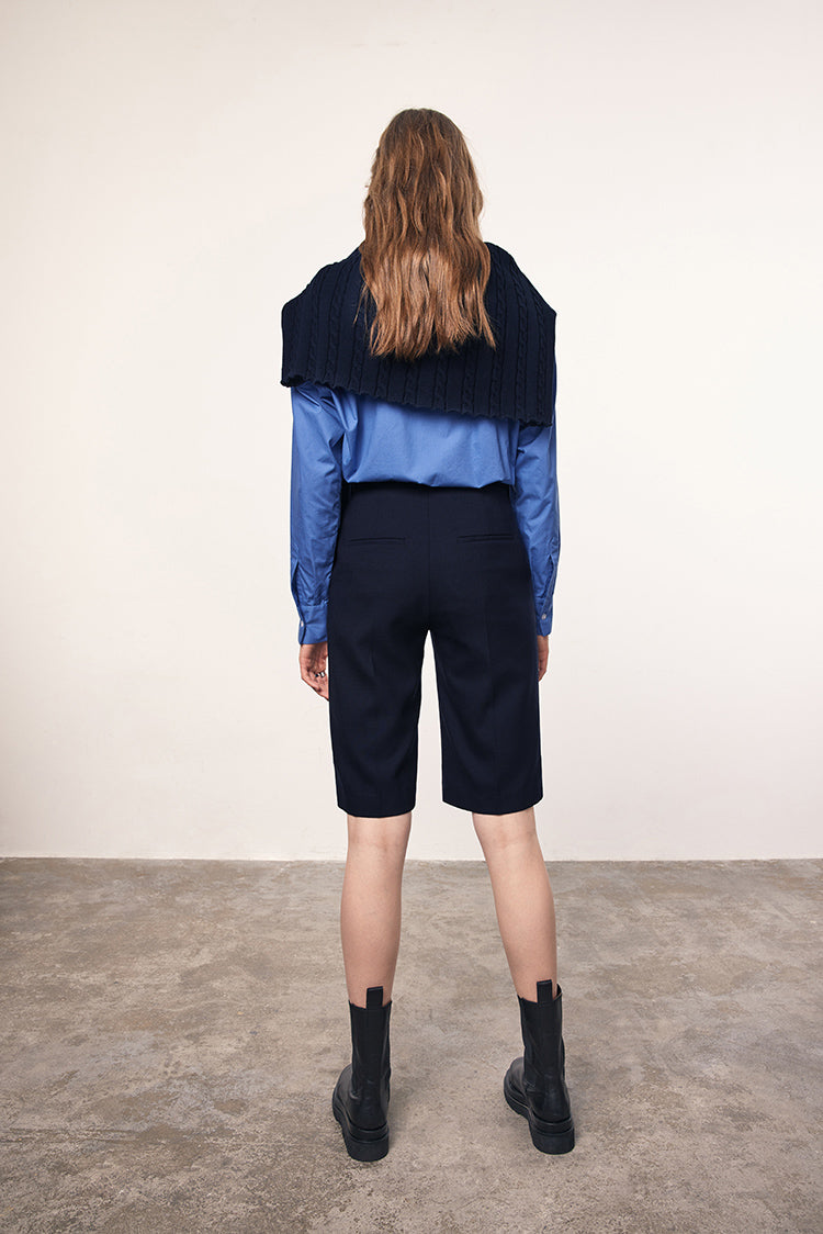 MADENAM. Miu Miu style. Oversize shirt. Navy. White. Pointed collar with button. Botton front closure. Adjustable button cuffs. Style with bralette. Short Skirt. Wide leg pants. Available in size XS, S, M, L