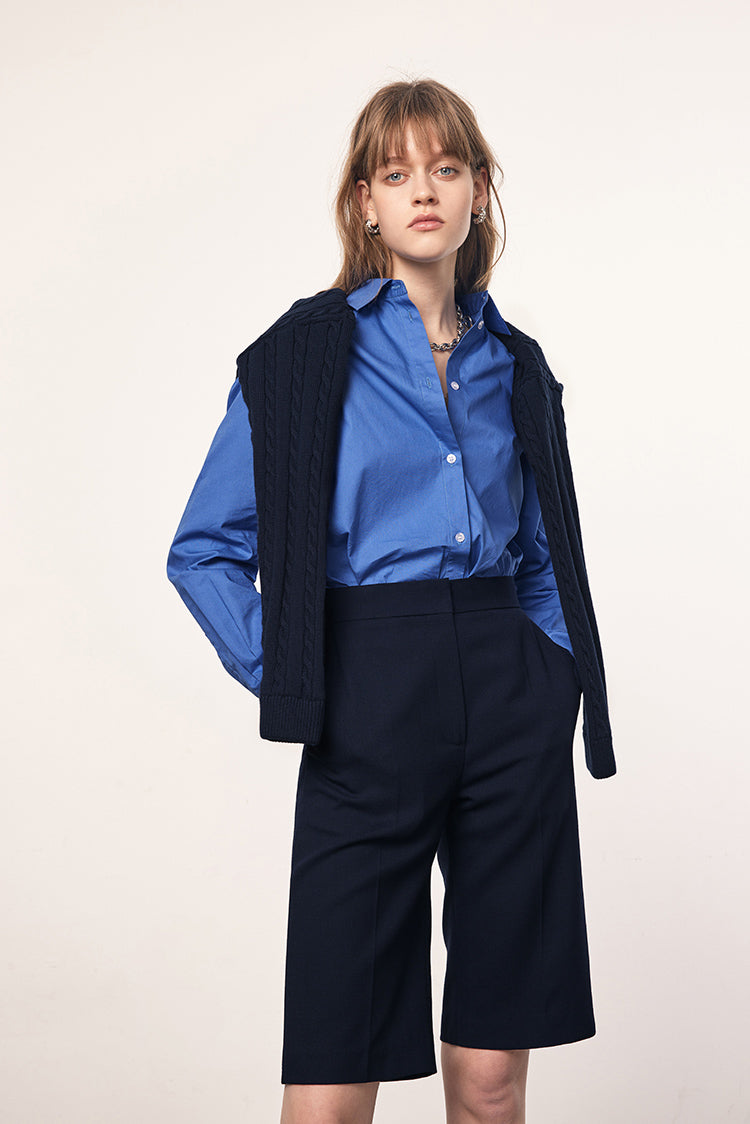 MADENAM. Miu Miu style. Oversize shirt. Navy. White. Pointed collar with button. Botton front closure. Adjustable button cuffs. Style with bralette. Short Skirt. Wide leg pants. Available in size XS, S, M, L