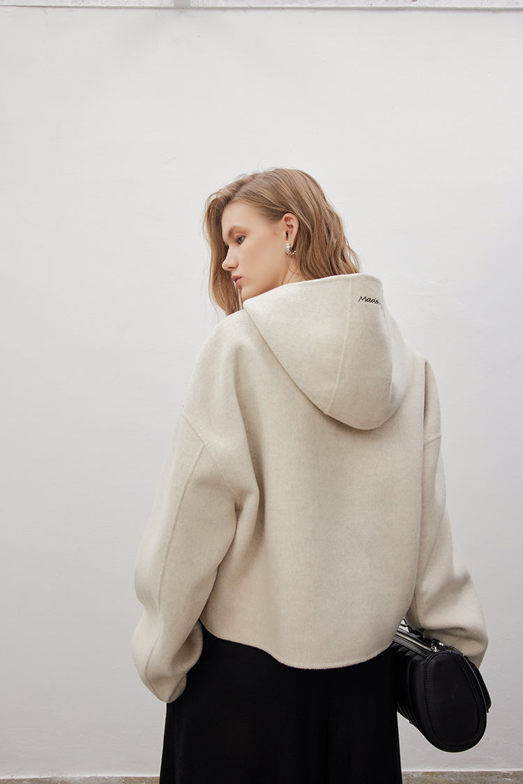 MADEINAM. Wool hoodie. Texture double wool knit. V-neck line Lower side button. Relaxed pullover hoodie. Light beige. Size: XS, S, M,L. Hailey Biber